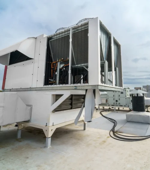 Multizone air conditioning and ventilation system. Outdoor units on the roof of a large industrial building. Industrial air-to-water chillers